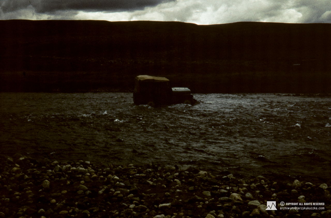Jeep caravan crossing the river.